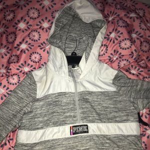 Grey and white windbreaker